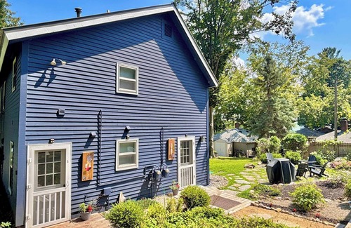 Rapid City House | Cozy Main Level Torch Lake Stay with Private Entry & Fire Pit