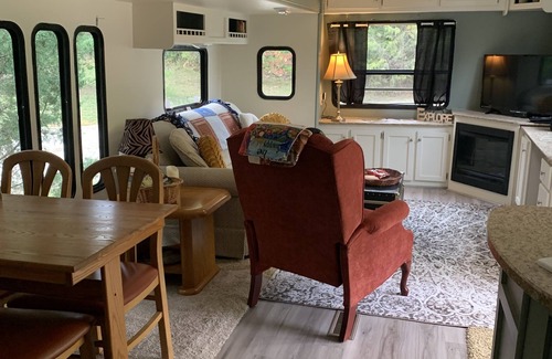 Peebles House | Cozy newly remodeled camper with hot tub and fire pit close to hiking/kayaking