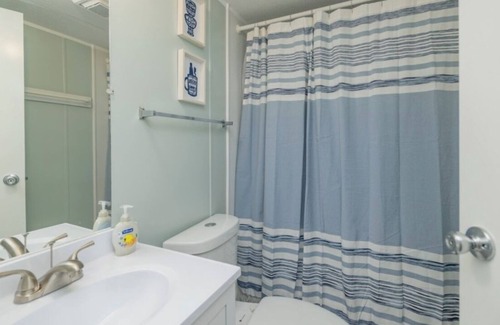 Wildwood Point House | Cozy retreat waterfront on beautiful Lake Gaston with community pool.