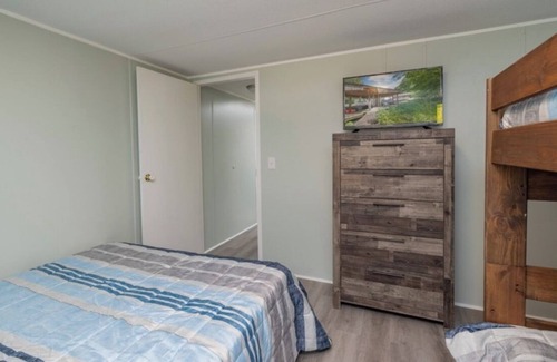 Wildwood Point House | Cozy retreat waterfront on beautiful Lake Gaston with community pool.