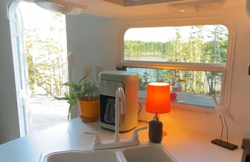 Lepreau House | Cozy waterfront property nestled amongst spruce trees.nPet friendly.