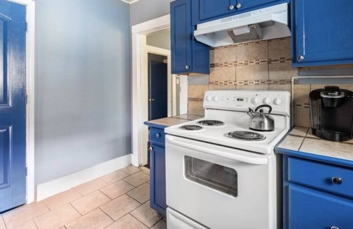 Mid City North House | Cozy Yellow Home near LSU and Downtown
