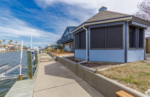 City-by-the Sea House | Crazy about fishing? Check out this home on deep canal near Estes Flats, Redfish Bay, and the Intracoastal Waterway!