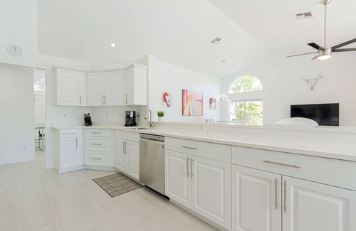 Crown Pointe House | Crown Pointe- Covered Lanai w/TV-Heated South Facing Pool, Newly Renovated home w/3 king beds!