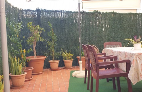 El Morche Apartment | Cupid Beach El Morche. Patio, Coast, Sea and Beach.