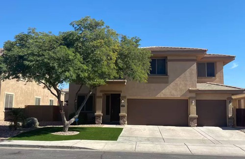 Roosevelt Park House | Custom home with 5 Beds & 5.5 Baths! A heated pool & spa make the backyard feel like a resort