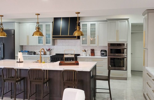 Caloosahatchee House | Custom Home with tile pool, boating dock and every comfort