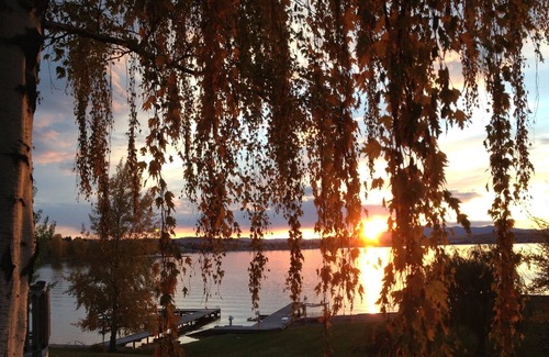 Polson Cottage | Daly Cottage Offers a Beach, Dock, Private Boat Ramp and is Pet Friendly!