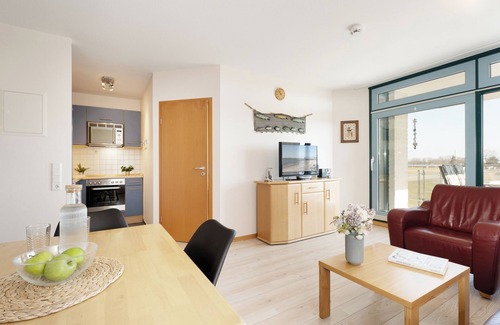 Ostholstein Apartment | Apartment Strandburg Wehrend with balcony in the house Am Süd 9 on Fehmarn
