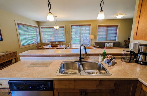 Golden Condo | Deckview: 2-bedroom top floor condo with hot tub and mountain views
