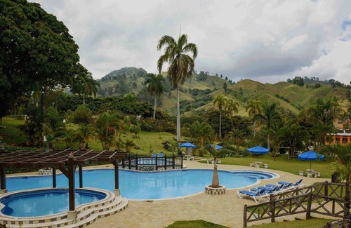 Las Guazaras Apartment | Deluxe Room with Air Conditioning - Jarabacoa RD