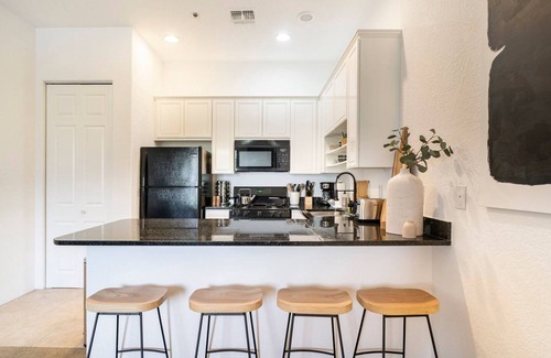 Village Apartment | Designer Desert Condo Pool Hot Tub Dogs Welcome