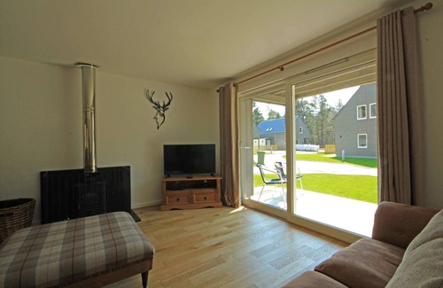 Coylumbridge House | Detached holiday home with hot tub and sauna on Aviemore Ski road