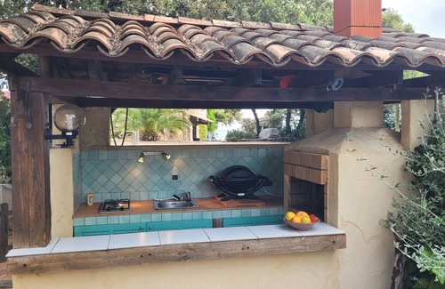 Pinarellu Apartment | direct beach area, large terrace, summer kitchen, high equipment, pizza oven