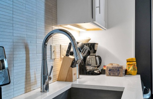 Faubourg Marigny Hotel | Discover a dreamy 2-bedroom hideaway in the Marigny, where charm, style, and culture blend seamlessly. Located steps from Frenchmen Street and the French Quarter, this stylish space is perfect for both relaxation and exploration. Enjoy the vibrant at