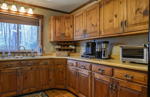 Accident House | Dog-friendly cabin with firepit, deck, private hot tub, fireplace