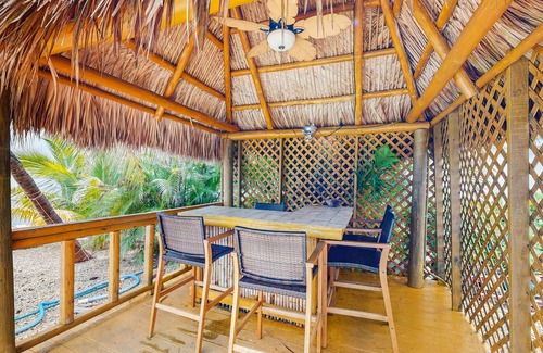 Tropical Bay Estates House | Dog-friendly home with waterfront views, a pool & Wifi