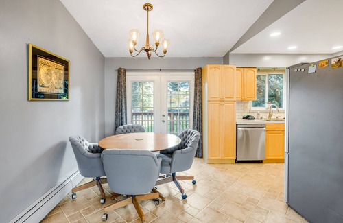 Eagle River House | Dog-friendly home with a fenced yard, putting green, & shared washer/dryer