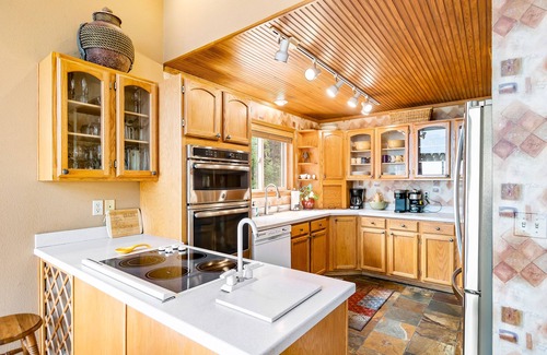 Sandpoint House | Dog-friendly mountain retreat near skiing with lake view, hot tub, & balcony
