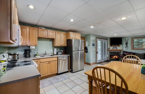 Boyne Falls Hotel | Dog-friendly ski-in/out condo near lifts with ski views, pool, tennis, hot tub