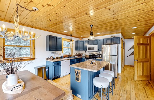 Rumford Center House | Dog-friendly Sunday River retreat with hot tub, large yard, grill, washer/dryer