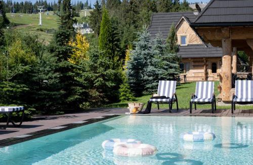 Bialka Tatrzanska Ski Chalet | Domki w Białce WOODHOUSE- Twój górski azyl przy stoku, z basenem i relaksem w saunie