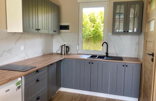Mielno Cabin | Domki wczasowe "Anna" - dom wakacyjny na wyłączność 75 m2
