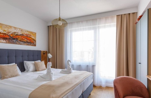 Morbisch am See Cottage | Doppelzimmer mit Boxspringbett, Balkon - Pension Laubenhof