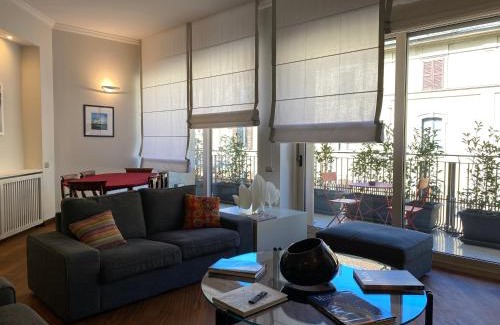 San Vittore Apartment | Dormire tra foto d’autore
