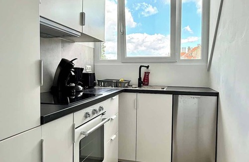 Jette Apartment | Doux nid perche avec vue magique sur la Ville