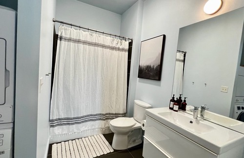 Crossroads Arts District Apartment | Downtown Stunner Right on Street Car