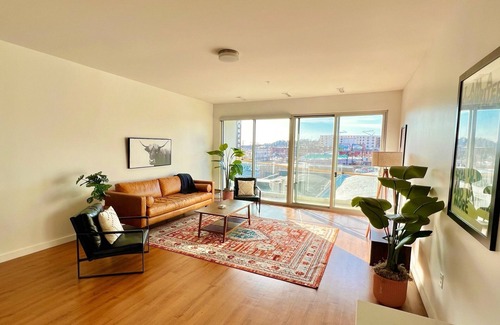 Crossroads Arts District Apartment | Downtown Stunner Right on Street Car