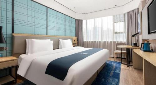 Shajing Hotel | Echarm Hotel Shenzhen International Exhibition Center Fuyong