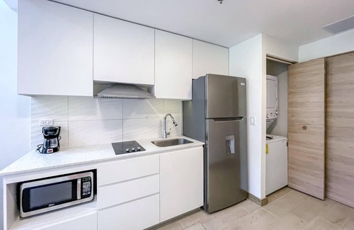 Crawfish Rock Condo | Elegant 1BR in Duna Residences