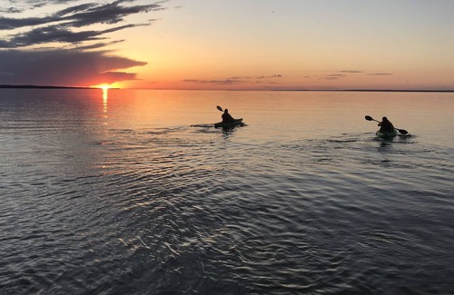 Cheboygan House | Elegant beachfront home with BOAT SLIP/Club amenities within walking distance.