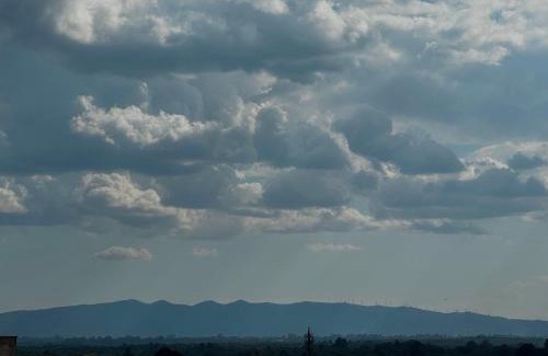 Kilimani Apartment | Elegant Wilma Towers Apartment - Golden Sunsets and Ngong Hills View