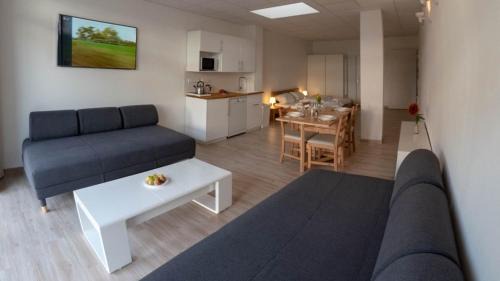 Sanderau Apartment | Eleonoras Ferienwohnung in Würzburg Stadt mit Terrasse im Erdgeschoss inklusive eigenen Parkplätzen vor der Tür