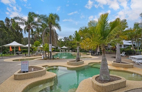 Cams Wharf Villa | Elysian Escape - 4 Pools, Lakeside, Raffertys Resort