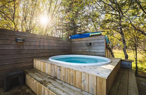 Blaskogabyggd Cabin | Embrace Nature by the River: Hot Tub & Scenic Views