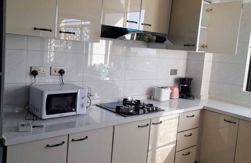 Mbotela Apartment | Enchanting 5-bedroom apartment with fitness room in Nairobi