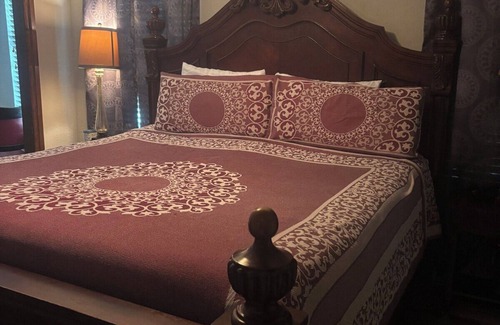 Norman Apartment | English Room at Whispering Pines Inn