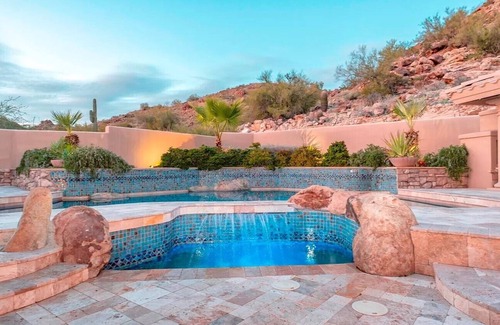 Mountain Park Ranch House | Enjoy breathtaking views of the mountainside throughout this hillside estate.