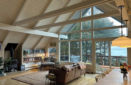 Kodiak House | Enjoy channel views from the hot tub. Minutes walk from downtown and waterfront.