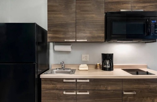 Tucson House | Enjoy Full Kitchen in Comfortable Room, Pet-Friendly Near University Campus
