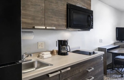 Tucson House | Enjoy Full Kitchen in Comfortable Room, Pet-Friendly Near University Campus