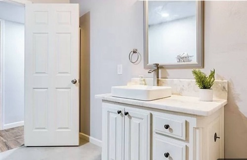 San Angelo House | Enjoy this beautiful wood floor and more!