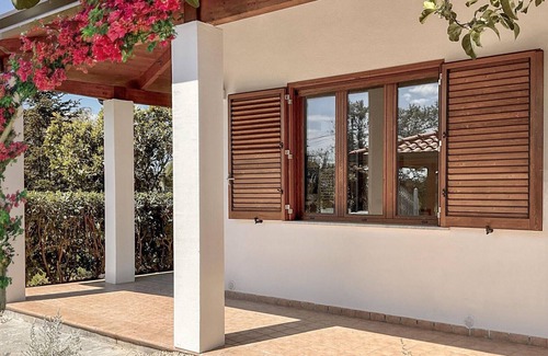 Panza House | Enjoy unforgettable days in this inviting vacation home near the beach.