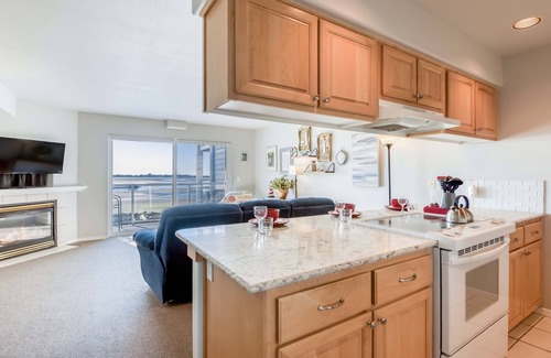 Lincoln City Condo | Enjoy views of Siletz Bay from this 3rd Floor Condo. beach access, Taft District