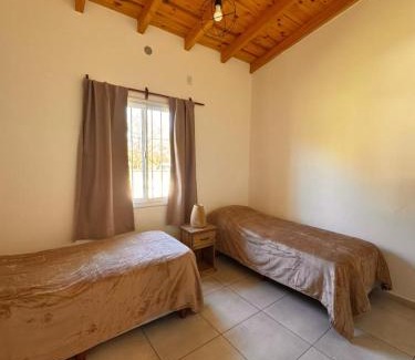 Las Rosas Ski Chalet | Entre Algarrobos - Cabañas con pileta y naturaleza