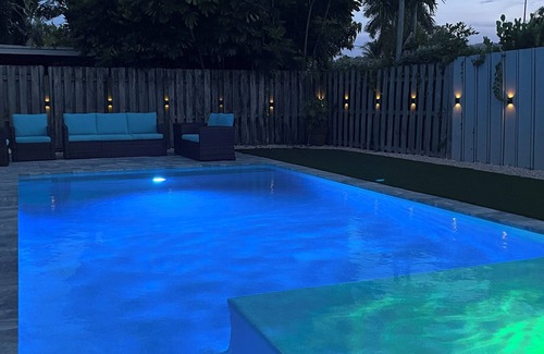 Coral Heights House | Escape in Backyard Oasis! Saltwater heated pool, 2 miles to the beach!